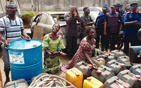 The-suspects-with-officials-of-NSCDC-480x300