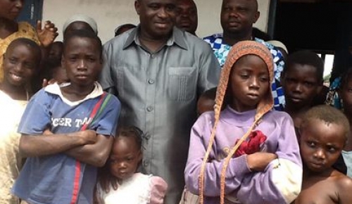 NAFDAC DG, DR. PAUL ORHII WITH SOME OF THE DISPLACED CHILDREN