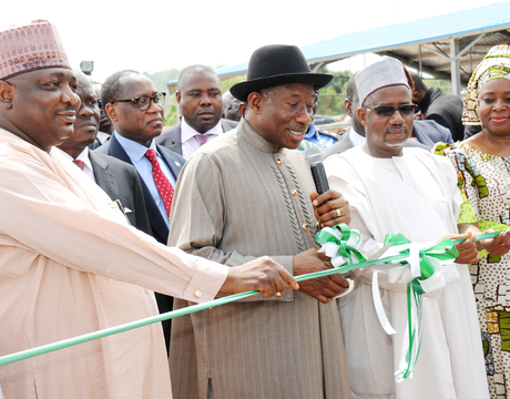 PRESIDENT GOODLUCK JONATHAN (2ND L) CUTTING THE TAPE TO INAUGURATE THE PHASE 3 AND 4 LOWER USUMAN DAM WATER TREATMENT PLANTS IN ABUJA ON THURSDAY (10/4/14). WITH HIM ARE FROM LEFT: CHAIRMAN, SENATE COMMITTEE ON POWER, SEN. PHILIP ADUDA; FCT MINISTER, SEN. BALA MOHAMMED AND FCT MINISTER OF STATE, OLOYE OLAJUMOKE AKINJIDE.