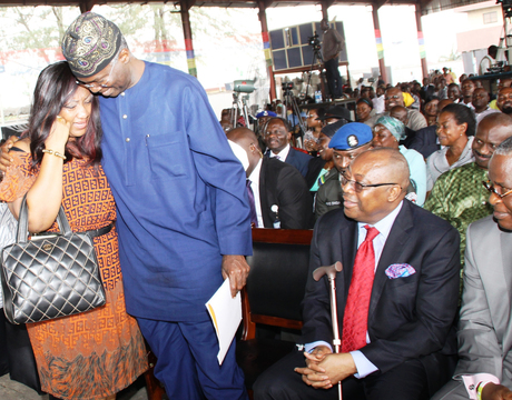 FROM LEFT: EMOTION LADEN WINNER OF A 3-BEDROOM APARTMENT AT SOGUNRO HOUSING SCHEME, MRS OLUWATOYIN LEKAN-LAWAL;  GOV. BABATUNDE FASHOLA OF LAGOS; COMMISSIONER FOR HOUSING, MR BOSUN JEJE AND COMMISSIONER FOR PHYSICAL PLANNING, MR TOYIN AYINDE,  AT THE 3RD DRAW OF LAGOS HOMES OWNERSHIP SCHEME IN LAGOS ON WEDNESDAY (7/5/14).