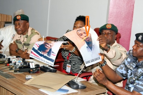 SECURITY AGENCIES AT A JOINT PRESS BRIEFING IN ABUJA ON MONDAY (ENLARGED PHOTO OF AMINU OGWUCHE ARROWED)