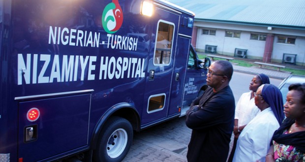 EX-GOV. PETER OBI WITH REVEREND SISTERS WATCHING THE AMBULANCE CONVEYING DORA AKUNYILI’S BODY INTO THE MORTUARY OF THE NATIONAL HOSPITAL, ABUJA, LAST WEEK