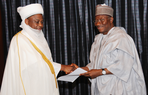 PRESIDENT GOODLUCK JONATHAN (R), RECEIVING A REPORT FROM THE SULTAN OF SOKOTO, ALHAJI SA'AD ABUBAKAR III, DURING THE MEETING OF NIGERIAN SUPREME COUNCIL FOR ISLAMIC AFFAIRS WITH MR PRESIDENT JONATHAN IN ABUJA ON WEDNESDAY (26/3/14).