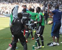 Mazembe secure semis place in style