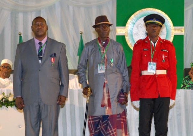 President Jonathan Approves Abuja Flat For Steward, Two Others 1 L-R; HEAD OF PRESIDENTIAL STEWARDS ONUH ISAAC MICHAEL (MON), TAXI DRIVER, MR. IMEH UBRU (MFR) AND TRAFFIC WARDEN, CPL.SOLOMON DAUDA (MON), AT THE 2013 AND 2014 NATIONAL HONOURS AWARD ON MONDAY.