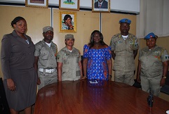 MoI Perm Sec with members of the peace corps 