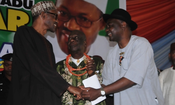 GEN. BUHARI IN WARM HANDSHAKE WITH SEN. MAGNUS ABE ON THURSDAY 