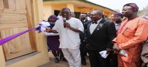 Representative of the Ekiti State D. Gov., Mr. Oyebode (left) commission the Security Post, with him are the Principal, Mr. Tanwa (2nd right) and the School PTA Chairman, Mallam Yusuf Ibrahim.