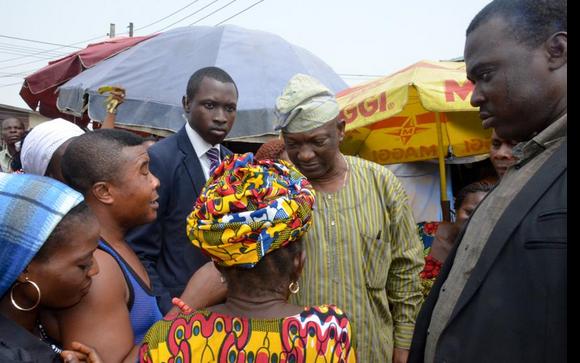 Agbaje answering questions from market women at Ogudu market