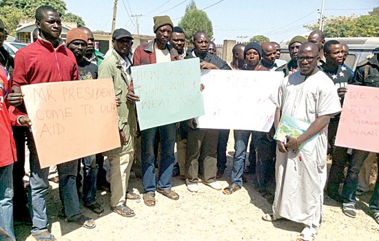 SOME OF THE DISMISSED SOLDIERS DURING THEIR PROTEST IN JOS … FRIDAY. (PHOTO: GUARDIAN NEWSPAPER) 