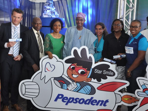 Dr. Khaliru Alhassan, Honourable Minister of Health (Middle); Ms. Myriam Sidibe, Director for Social Missions Africa, Unilever (3rd right); Dr. Olufunmilayo Ashiwaju, Vice President, Nigerian Dental Association (2nd R); Nsima Alakwe, Brand Build Director, Unilever Nigeria (R); Robbert deVreede, Vice President Marketing, Unilever Nigeria ( L); Dr. Bode Ijarogbe, President, Nigerian Dental Association (2nd L); and Dr. Bimpe Adebiyi, Director/Head of Dentistry, Federal Ministry of Health at the World Oral Health Day Celebration  organised by Pepsodent and the Nigerian Dental Association in Lagos, Friday