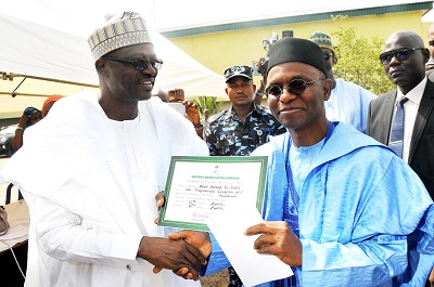 INEC-COMMISSIONER-PRESENTING-CERTIFICATE-OF-RETURN-NASIR-EL-RUFAI