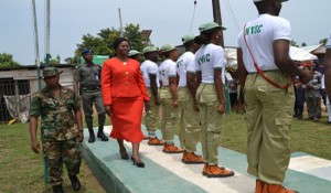 Wife of Ekiti State Gov., Mrs. Feyisetan Fayose inspecting the Guard of Honour mounted by members of the NYSC during her visit to the Orientation Camp at Ise/Emure-Ekiti.