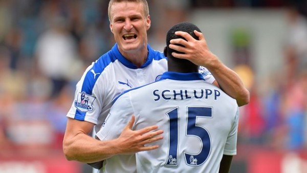 Robert Huth Celebrates Leicester's Perfect Premier League Start With Jeffrey Schlupp. Image: Getty via Premier League. 