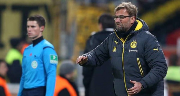 Jurgen Klopp Passes Instruction to His Wards During a Game at Bayer Leverkusen. Image: Getty.