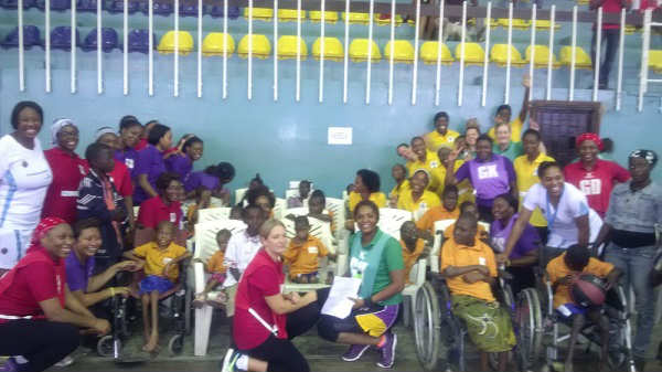 Participants at Charity Netball Tournament Themed -Giving is a Team Effort and Representatives from the Family Vocational Institute for the Disabled (FVID)