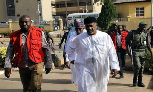 N2.1b Arms Scam: EFCC Consolidates Charges, To Re-arraign Dasuki, Others On November 16 1 Sambo Dasuki with EFCC Official