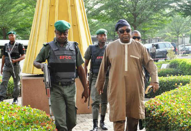 Alex S. Badeh with EFCC official