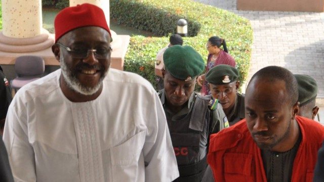 Olisa Metuh in court with EFCC official