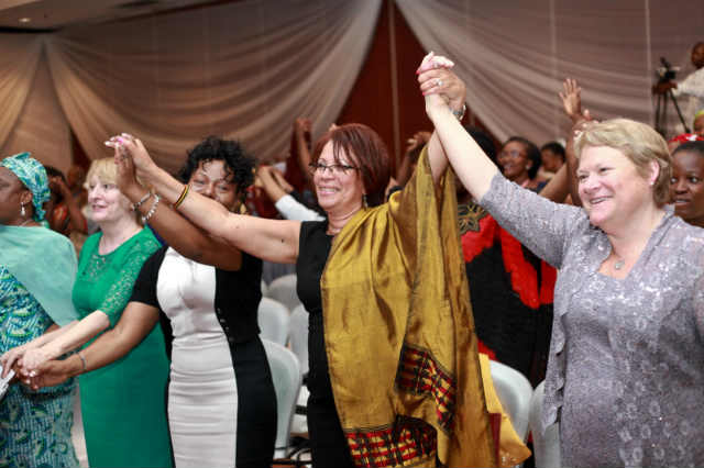 L-R: Margaret Richardson, Senior Midwifery Professional, NHS England; Jacqueline Dunkley-Bent, Professor of Midwifery, NHS England; Frances Day-Stirk, President, International Confederation of Midwife; Dr Ginger Breedlove, President, American College of Nurses and Midwives, chant "I am Proud to be a Midwife" at the Inaugural International Global Midwifery Conference in Abuja, Nigeria