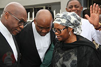 Nenadi Usman with others in court.