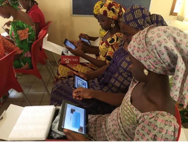 Picture of Rescued Chibok School girls using their Opon Imo Tablets