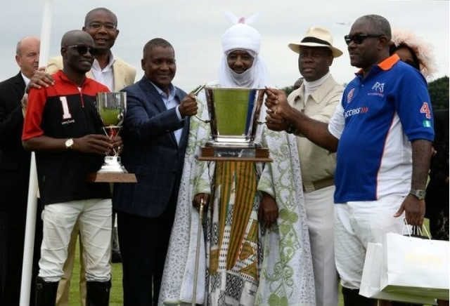 Access Bank Polo Day Emir of Kano Mohammed Sanusi II middle joined by the winning teams at the 2017 Access Bank polo challenge in Windsor UK
