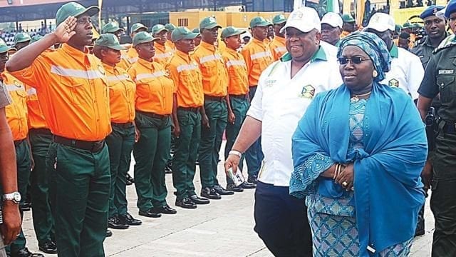 Lagos State Commissioner for Environment Samuel Adejare inspecting the guards at the inauguration of Lagos Environmental Sanitation Corps