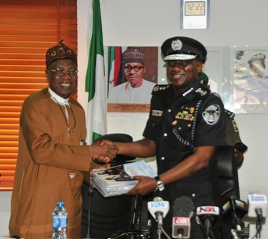 Minister of Information and Culture Alh Lai Muhammad with Inspector General of Police IGP Ibrahim Kpotun Idris