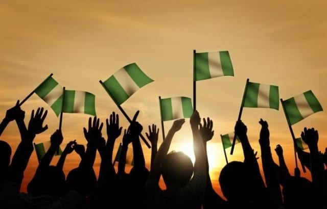 Nigeria and Nigerians People Waving Nigerian Flags