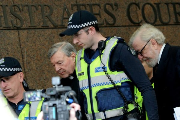 Police Officers and Lawyer with Cardinal George Pell