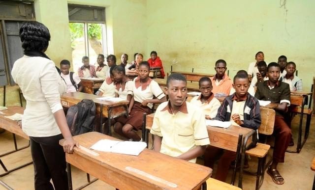 A NPOWER volunteer teaching her student during the visit to St. Margaret’s Secondary School 1 on 25082017