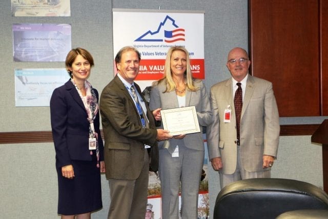 Micron's Virginia Values Veterans Certification Award being presented by John C. Harvey, Jr and John Newby