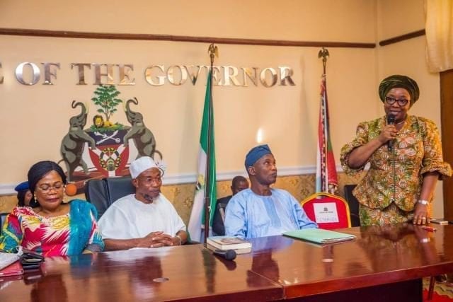 Osun State Governor Rauf Aregbesola with Sharon Ikeazor, the Executive Secretary, Pension Transitional Arrangement Directorate (PTAD) and Her Team