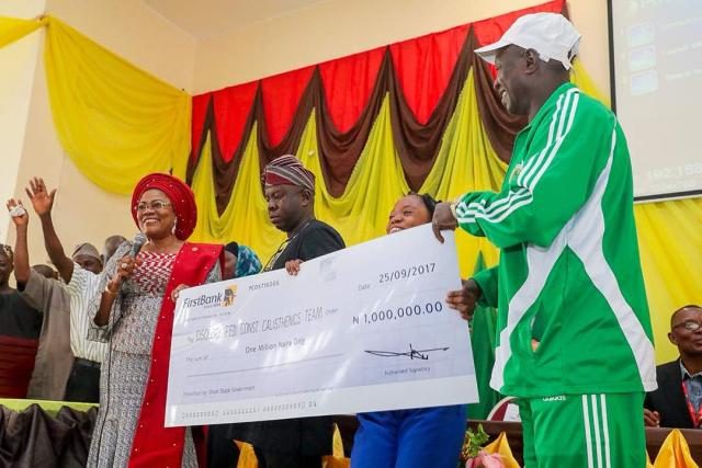 Presentation of N1m Cheque to the winners of the State of Osun Calisthenics Competitions which held in the 9 Federal Constituencies in the state.