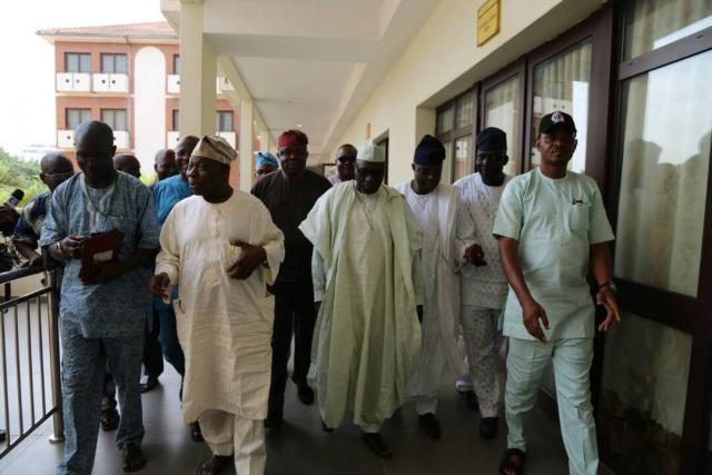 Chief Obasanjo and Senator Markafi step out after the two hours meeting