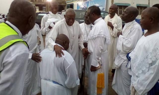 Hon Ladi kneels down for spiritual prayer by Most Sup Evangelist Taiwo Oshin ( MPIC)