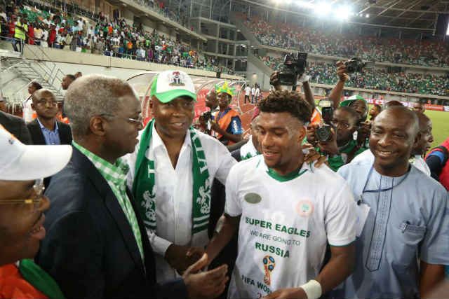 Senator Bukola Saraki and Barrister Babatunde Fashola congratulates the Super Eagles' Captain during Russia 2018 Qualifying Match in Uyo