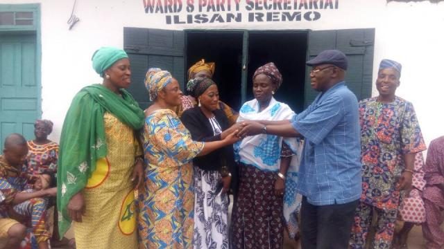 Hon Seye Sonuga hands over Alhaja Funmi Muhammed (middle) to ward 8 executives