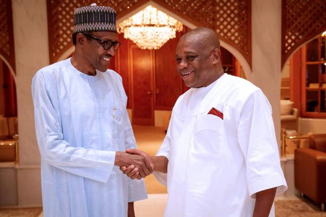 President Muhammadu Buhari in hand shake with Chief Orji Uzor Kalu