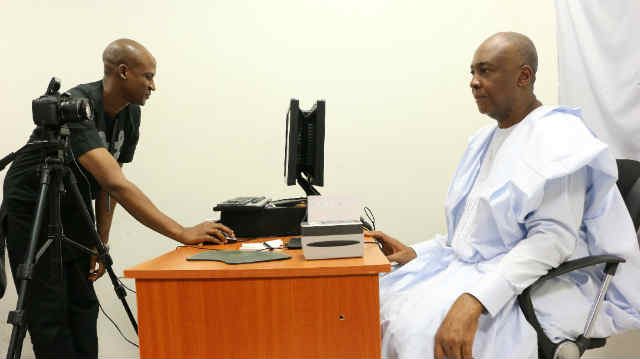 Nigeria's Senate President Bukola Saraki at the Nigerian Immigration Service Office