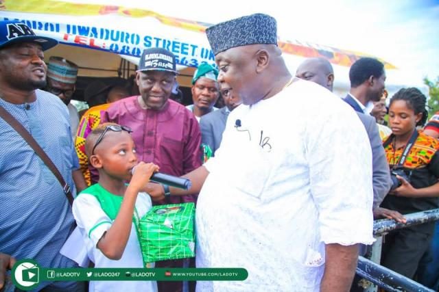 8-year old Master Bakare Basit sings - Awa Lomo Egbe Ladi - to the admiration of Hon Ladi Adebutu