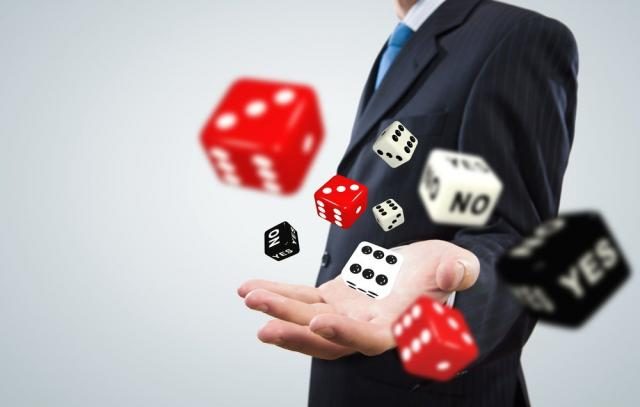 Major Gambling Operators started to leave Gibraltar and move to Malta 1 Man with Gambling Dices