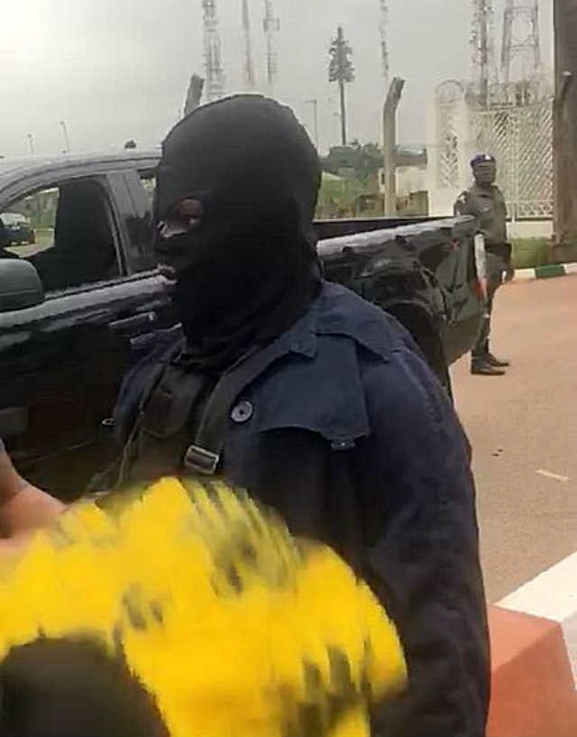 Masked security personnel at the NASS Complex, Abuja