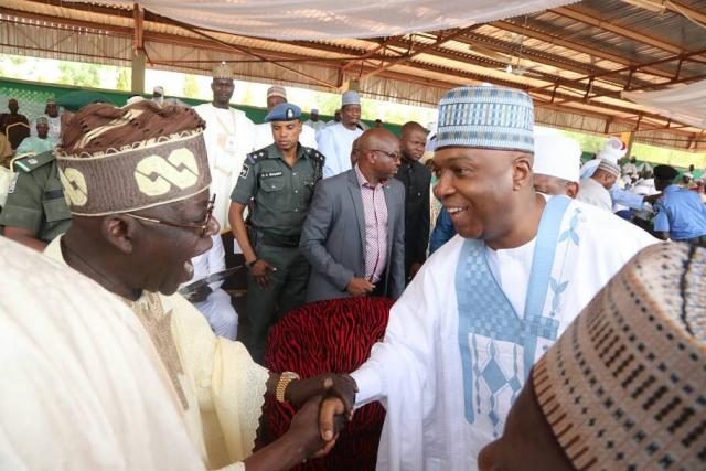 Bola Tinubu in a dramatic Handshake with Bukola Saraki