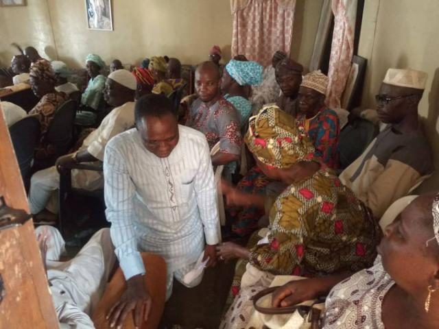 Omooba Sunday Solarin receives special prayers from Mrs Sauli Ladegbuwa