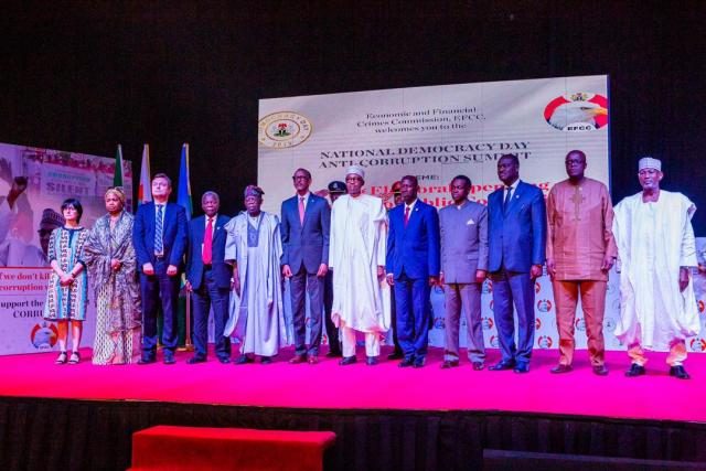 President Muhammadu Buhari with other dignataries at the National Democracy Day Anti-corruption Summit