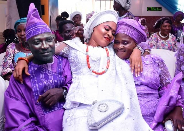 The bride, Aanuoluwapo with her parents