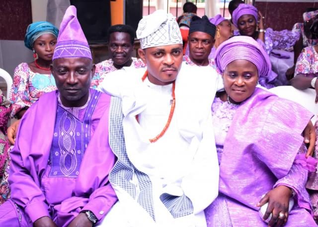 The groom, Adedeji with the bride's parents
