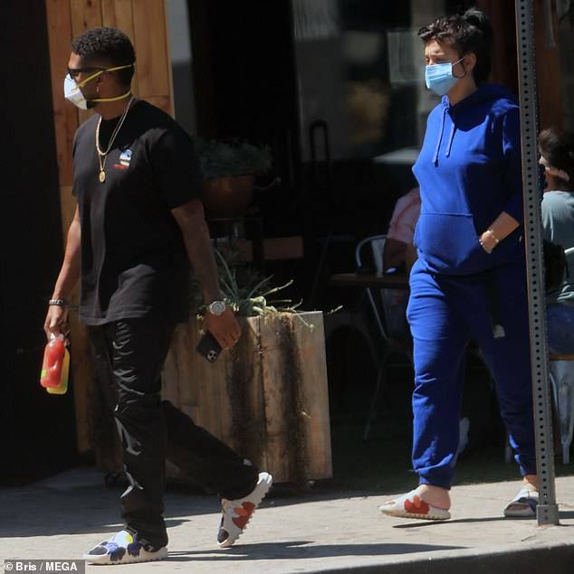 Usher Raymond and Jenn Goicoechea